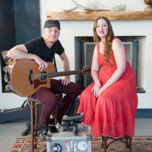 Image of Sara Wiley and guitarist at Austin Monthly event.