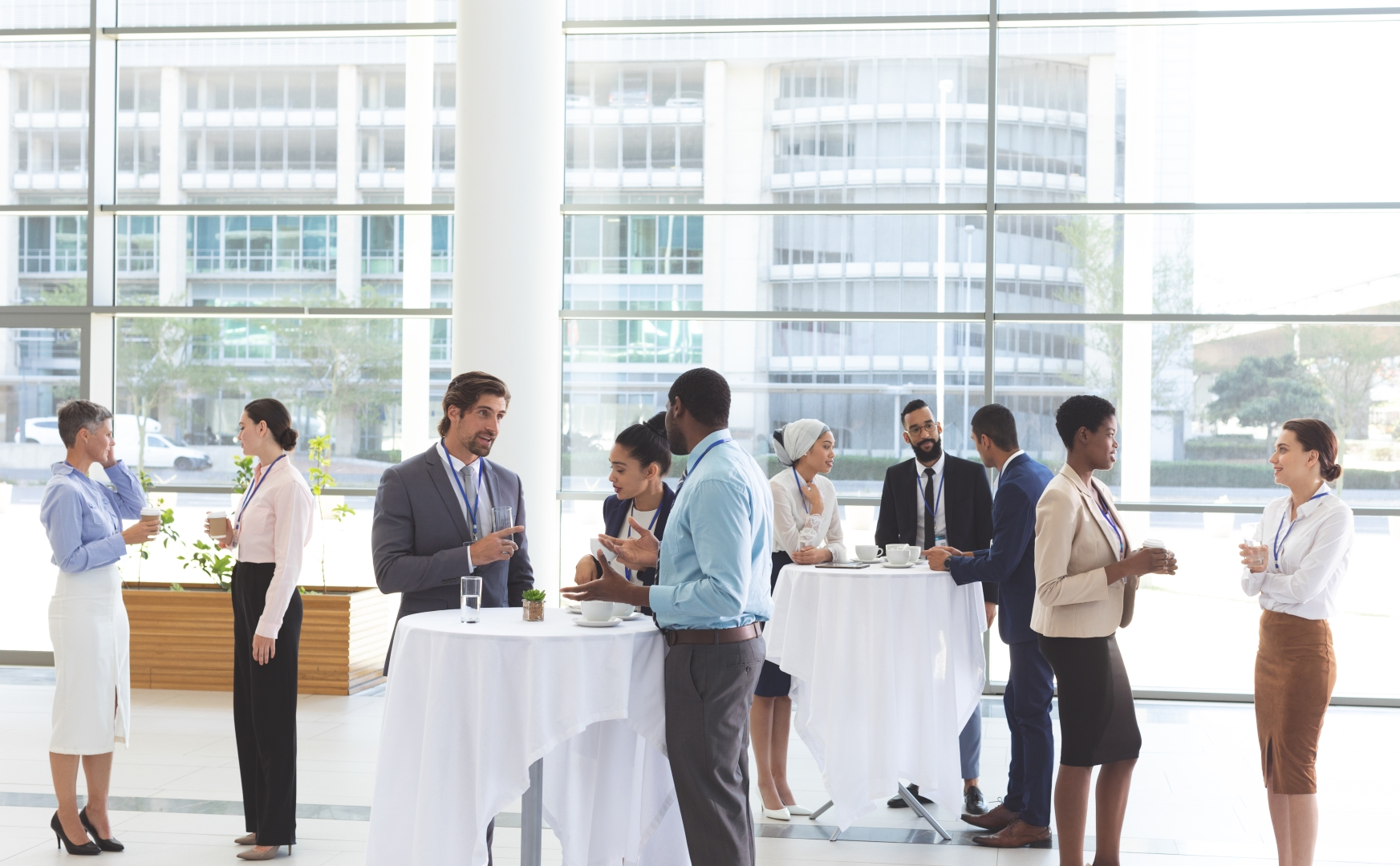 Business participants discussing priorities around a meeting table